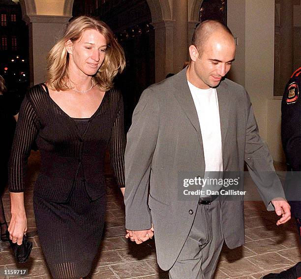 Tennis players Steffi Graf and Andre Agassi leave the Venetian Hotel September 24, 1999 in Las Vegas, NV. Graf gave birth to a healthy son, Jaden...