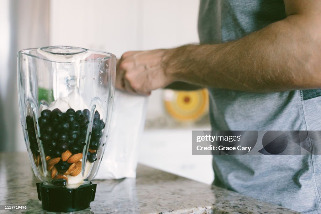 Man Prepares Shake After Workout