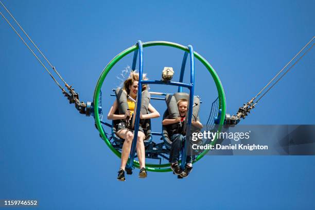 140 Sling Shot Ride Stock Photos, High-Res Pictures, and Images