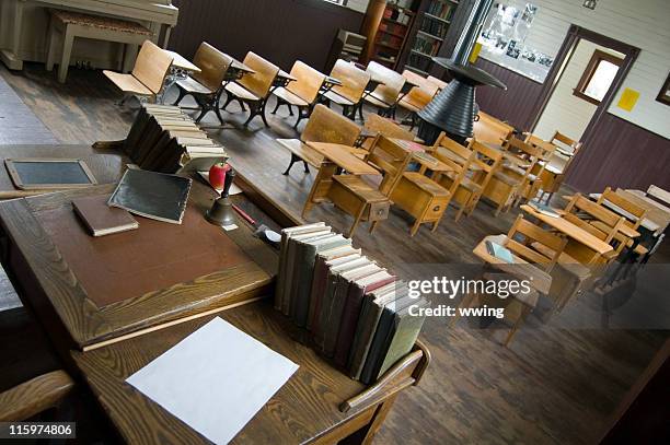 vintage school classroom-teacher and student desks - schoolhouse stock pictures, royalty-free photos & images