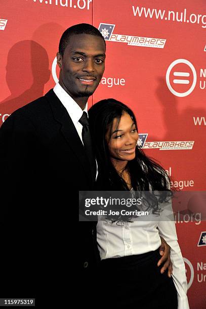 Former NFL wide receiver Plaxico Burress and wife Tiffany Burress attend a press conference at National Urban League on June 13, 2011 in New York...