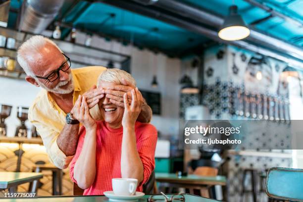 he's the sweetest person i know - old couple restaurant stock pictures, royalty-free photos & images