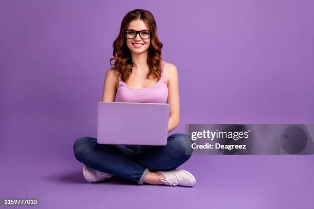 Portrait of attractive teen teenager have modern technology feel content glad satisfied wear singlet denim youth hipster purple colorful bright background isolated