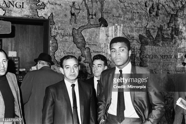 Muhammad Al in with trainer Angelo Dundee. Circa 1967.