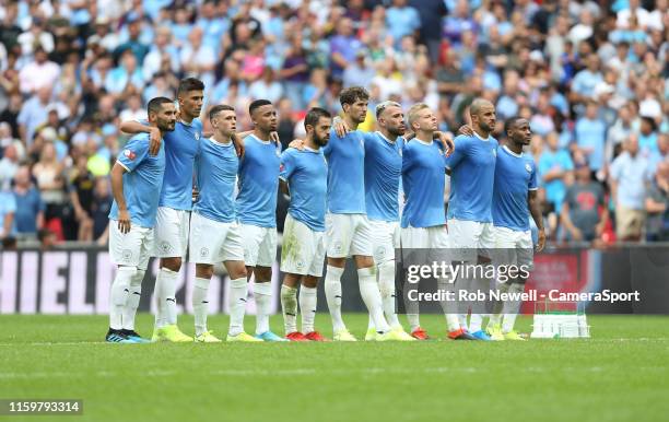 Manchester City line up for penalties during the The FA Community Shield match between Liverpool and Manchester City at Wembley Stadium on August 4,...