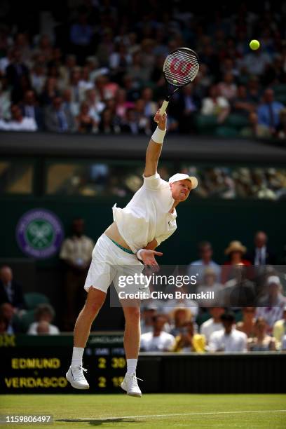 Kyle Edmund of Great Britain serves in his Men's Singles second round match against Fernando Verdasco of Spain during Day three of The Championships...