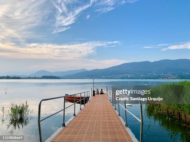 friends enjoying lake varese - varese stock pictures, royalty-free photos & images