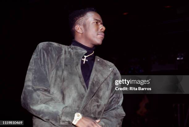 Low-angle view of American singer and rapper Bobby Brown at Harlem's Apollo Theater, New York, New York, February 9, 1990.