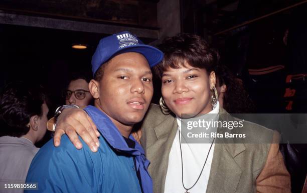 American rapper Queen Latifah poses with an unidentified man at the MK Club, New York, New York, April 1990.