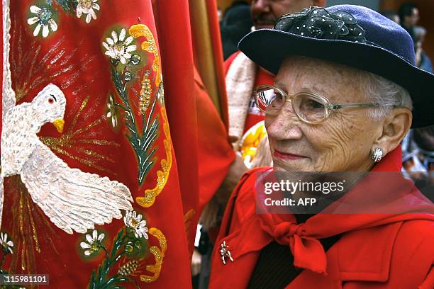 Believer takes part in the "Procissao do Divino Espirito Santo" , in Mogi das Cruzes, some 50 km east of Sao Paulo, Brazil, on June 11, 2011. This...