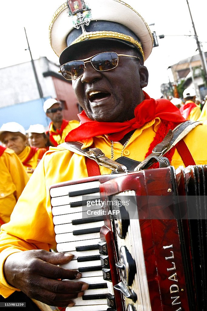 A member of Congada folk group performs