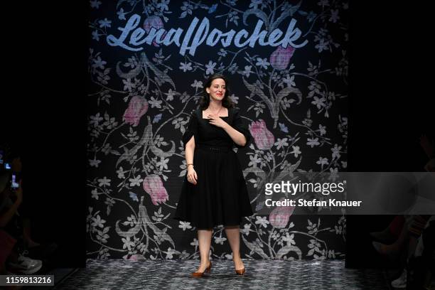 Designer Lena Hoschek acknowledges the applause of the audience after her show during the Berlin Fashion Week Spring/Summer 2020 at ewerk on July 03,...