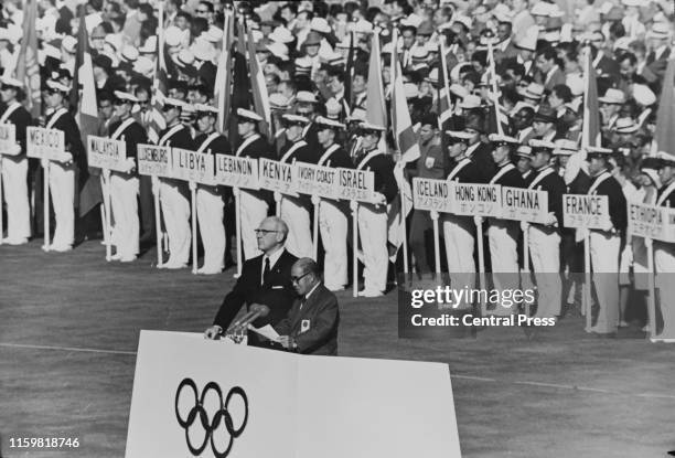 Avery Brundage, President of the International Olympic Committee stands with Daigoro Yasukawa President of the Tokyo Olympic Organizing Committee...