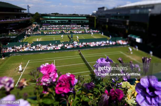 General view of court 14 during the Men's Singles second round match between Ivo Karlovic of Croatia and Thomas Fabbiano of Italy during Day three of...