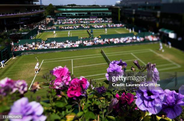 General view of court 14 during the Men's Singles second round match between Ivo Karlovic of Croatia and Thomas Fabbiano of Italy during Day three of...
