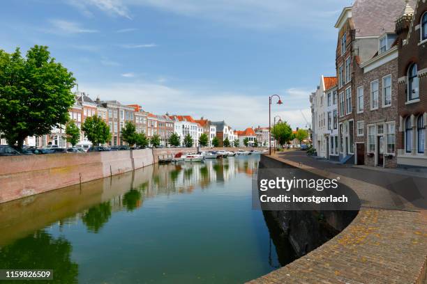 canal in middelburg - middelburg netherlands stock pictures, royalty-free photos & images