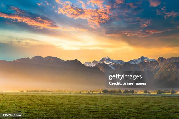 beautiful scenery landscape of the matheson lake fox glacier town southern alps mountain valleys new zealand - new zealand rural stockfoto's en -beelden