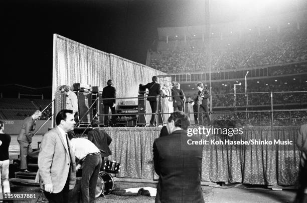 Ringo Starr, Paul McCartney, John Lennon and George Harrison of The Beatles get ready to start their show at the Dodger Stadium, Los Angeles,...