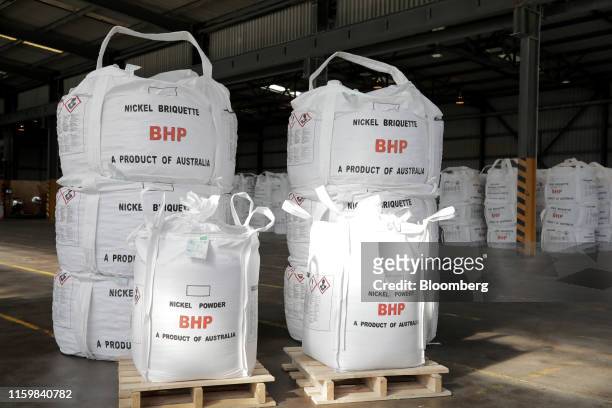 Bags filled with nickel briquette and nickel powder sit in a warehouse at the BHP Group Ltd. Kwinana Nickel Refinery in Kwinana, Western Australia,...