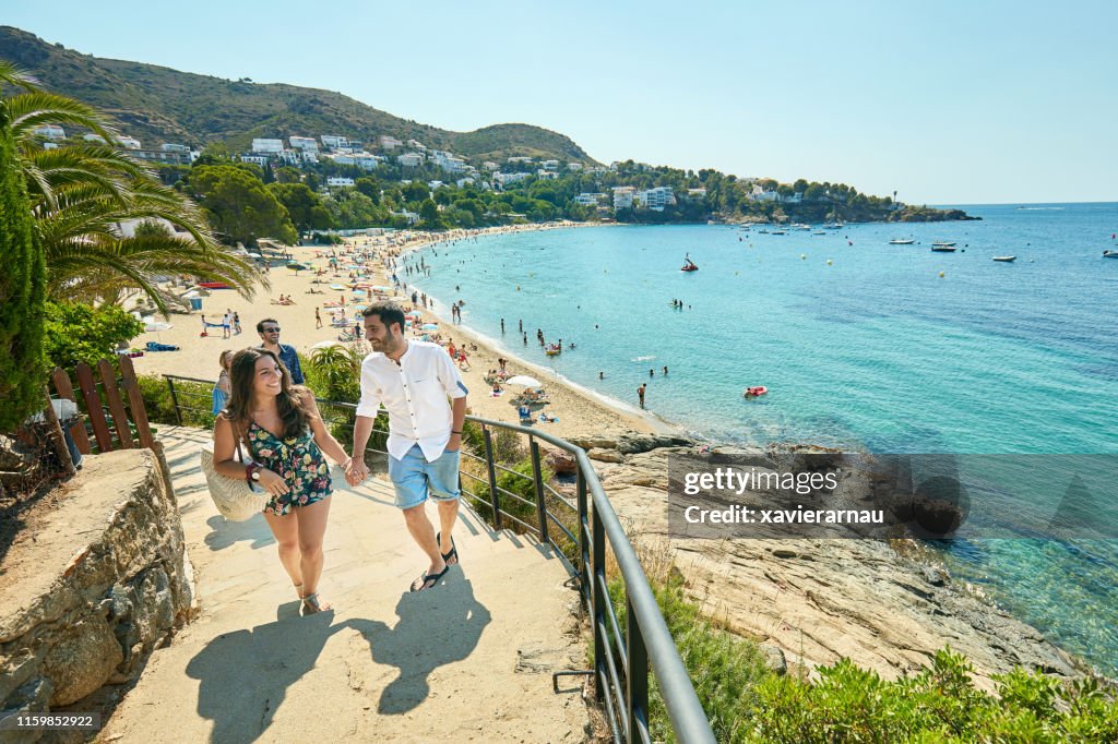 Young Romantic Couple Enjoying View of Costa Brava Beach