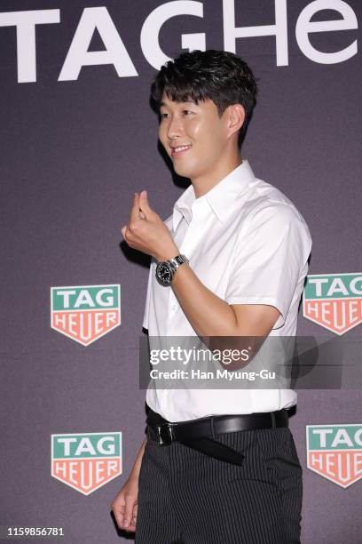 Son Heung-Min, watch detail, of Tottenham Hotspur FC attends the photocall for 'TAG Heuer' HMS Limited Edition Launch on July 03, 2019 in Seoul,...