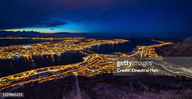 overview of tromsø (tromso) at blue hour - light pollution stock pictures, royalty-free photos & images