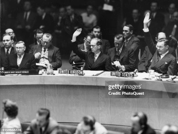 Members of the United Nations Security Council vote on the admittance of Japan, New York, New York, December 14, 1955. Among those pictured are, from...