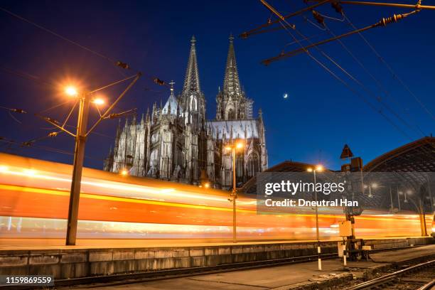 cologne cathedral, cologne central station and moon crescent - cologne stock pictures, royalty-free photos & images