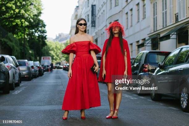 Giorgia Tordini and Gilda Ambrosio pose wearing Valentino after the Valentino Show during Paris Fashion Week - Haute Couture Fall/Winter 2019/2020 on...