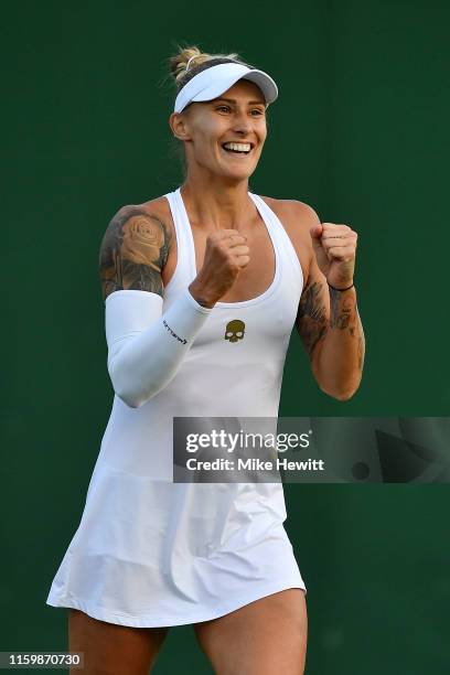 Polona Hercog of Slovenia celebrates match point in her Ladies' Singles second round match against Madison Keys of The United States during Day three...