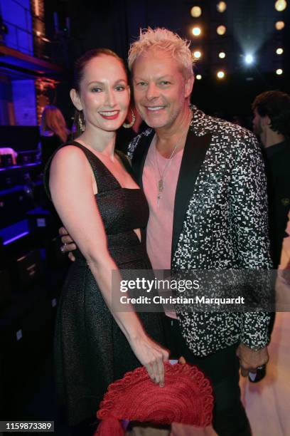 Christin Dechant and Uwe Fahrenkrog-Petersen attend the Atelier Michalsky show during the Berlin Fashion Week Spring/Summer 2020 at ewerk on July 03,...