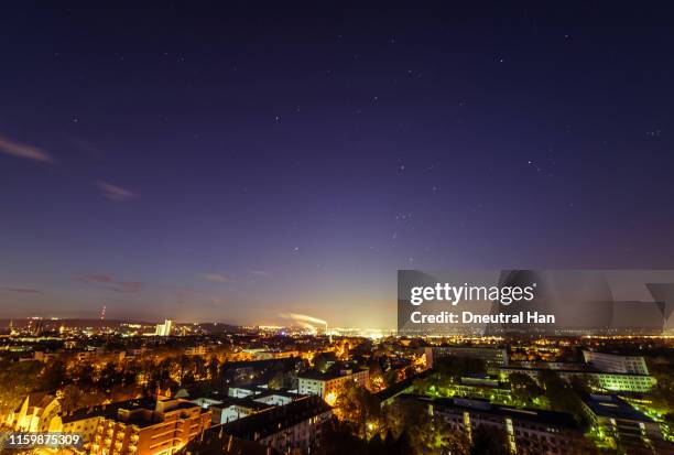 winter stars over bonn city - photopollution stock-fotos und bilder