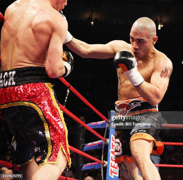 February 21: MANDATORY CREDIT Bill Tompkins/Getty Images Miguel Cotto defeats Michael Jennings by 5th-round TKO for the vacant WBO Welterweight Title...