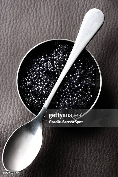 caviar and spoon - caviar stock pictures, royalty-free photos & images