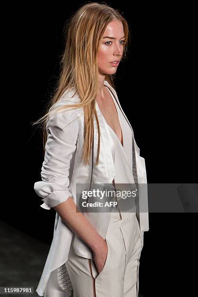 Brazilian top model Raquel Zimmermann presents an outfit by Animale during the 2011-2012 Spring-Summer collections of the Sao Paulo Fashion Week, in...