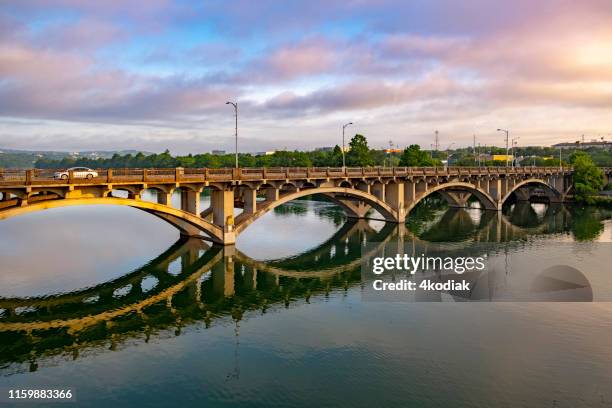 austin texas at dawn looking from pfluger pedestrian bridge - austin texas landmarks stock pictures, royalty-free photos & images