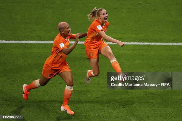 Jackie Groenen of the Netherlands celebrates after scoring her team's first goal with teammate Shanice Van De Sanden during the 2019 FIFA Women's...