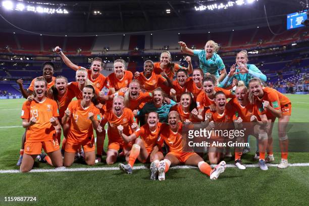 Netherlands players celebrate following their sides victory in the 2019 FIFA Women's World Cup France Semi Final match between Netherlands and Sweden...