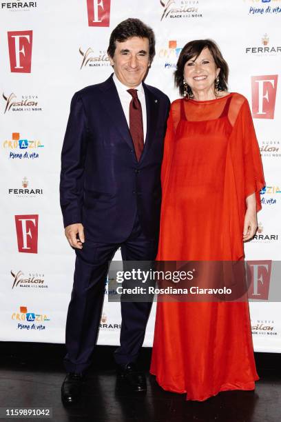 Urbano Cairo and Marisa Deimichei attend the F Magazine Party at Filippo La Mantia Oste e Cuoco restaurant on July 03, 2019 in Milan, Italy.