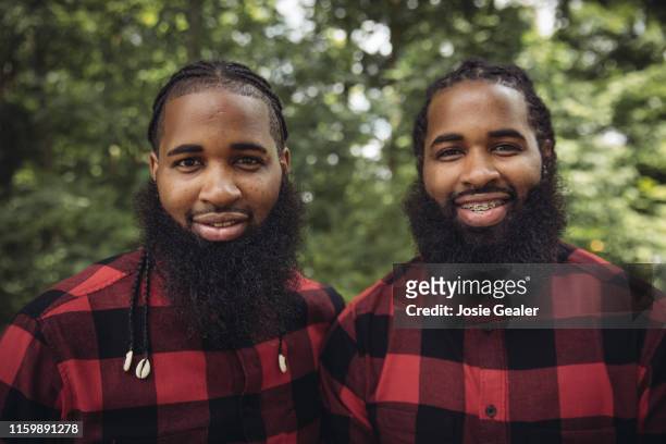 Identical twin brothers attend the Twins Days Festival at Glenn Chamberlin Park on August 4, 2019 in Twinsburg, Ohio. Twins Day celebrates biological...