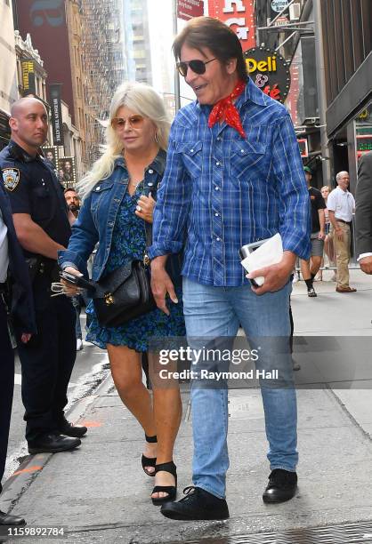 John Fogerty and wife Julie Lebiedzinski are seen outside Good Morning America on August 5, 2019 in New York City.