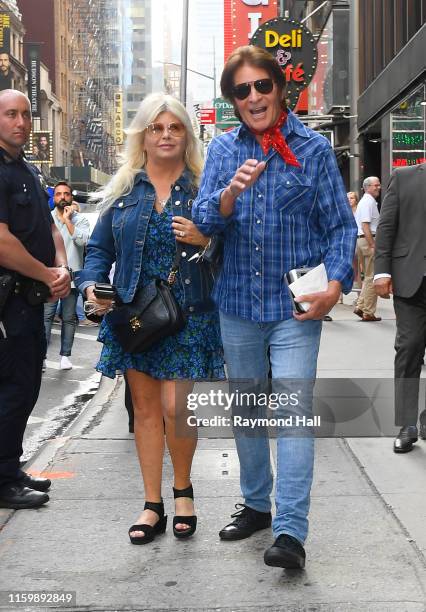 John Fogerty and wife Julie Lebiedzinski are seen outside Good Morning America on August 5, 2019 in New York City.