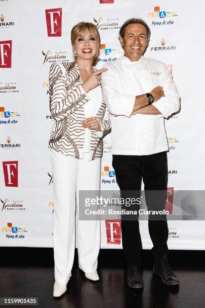 Milly Carlucci and Filippo La Mantia attend the F Magazine Party at Filippo La Mantia Oste e Cuoco restaurant on July 03, 2019 in Milan, Italy.