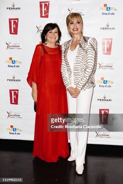 Marisa Deimichei and Milly Carlucci attend the F Magazine Party at Filippo La Mantia Oste e Cuoco restaurant on July 03, 2019 in Milan, Italy.