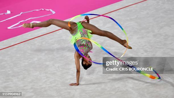 Brazilian Barbara Domingos performs her routine in the Individual Ribbon Gymnastics Final competition during the Lima 2019 Pan-American Games at the...