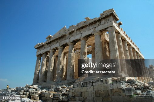 Ruins of the Parthenon in Greece against a blue sky