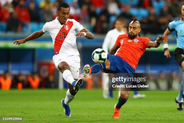 Renato Tapia of Peru fights for the ball with Arturo Vidal of Chile during the Copa America Brazil 2019 Semi Final match between Chile and Peru at...