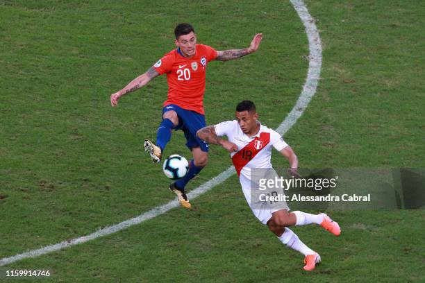 Andre Carrillo of Peru fights for the ball with Charles Aranguiz of Chile during the Copa America Brazil 2019 Semi Final match between Chile and Peru...