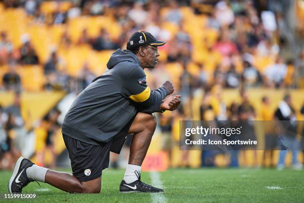 Pittsburgh, PA Pittsburgh Steelers Assistant Head Coach John Mitchell watches the players from mid-filed during the Pittsburgh Steelers training camp...