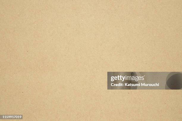 beige craft paper cardboard texture background - papel de pão - fotografias e filmes do acervo